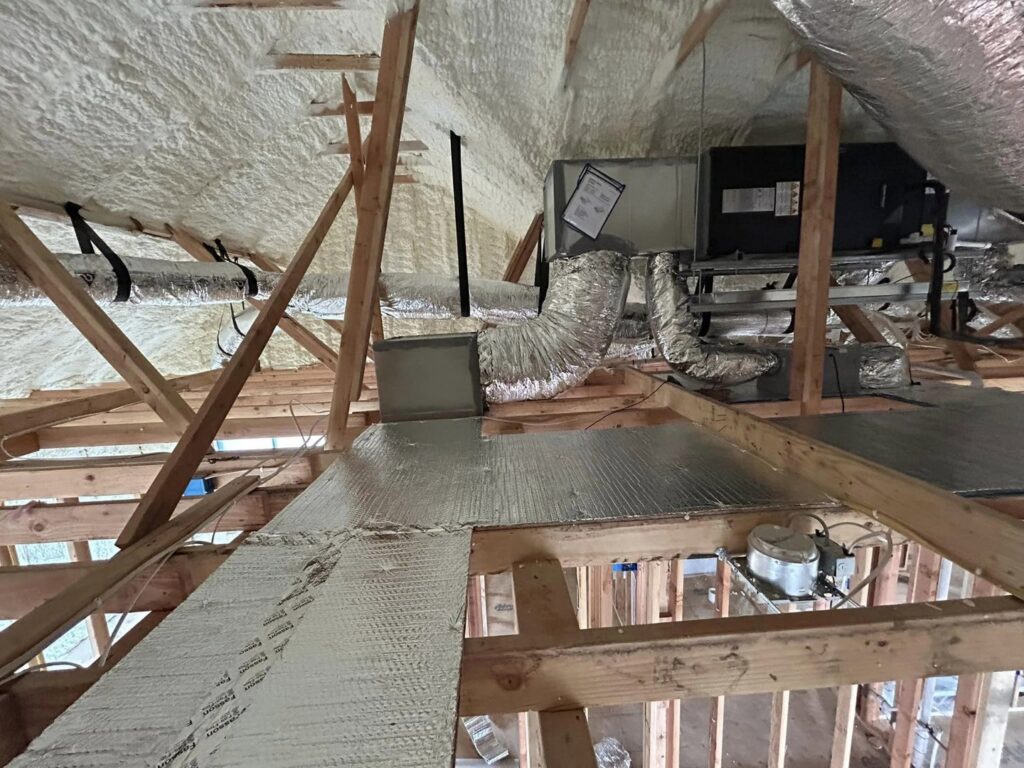 HVAC ductwork and units installed in an attic space by Chapman HVAC in Cleveland, OK.