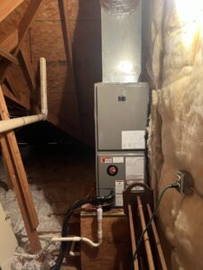 An HVAC furnace unit installed in an attic by Affordable heating and air conditioning in Meridian, MS.