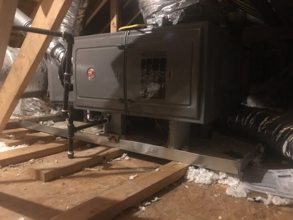 An HVAC furnace system with ductwork installed in an attic space by Gouker's Best Air in Franklin, TN.