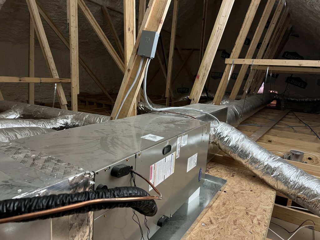 Complete HVAC system with air handler and extensive ductwork installed in an attic by That Air Conditioning Company LLC in Dothan, AL
