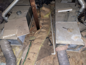 An HVAC system with ductwork visible in an attic space, serviced by Santos Heating and Cooling in St Joseph, MO.
