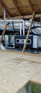 An HVAC system and ductwork installed in an attic by A1 Mechanical Heating and Cooling Services in Waynesville, OH.