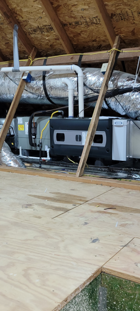 An HVAC system and ductwork installed in an attic by A1 Mechanical Heating and Cooling Services in Waynesville, OH.