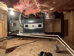An HVAC system with air handler and ductwork installed in an attic by AZ Perfect Comfort in Phoenix, AZ.