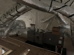 An attic HVAC system and ductwork installation completed by Symbiont Services in Englewood, FL.