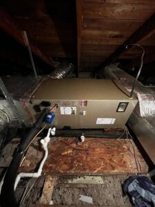 An HVAC unit and ductwork installed in an attic by Southern Comfort Heating & Cooling in Lexington, KY