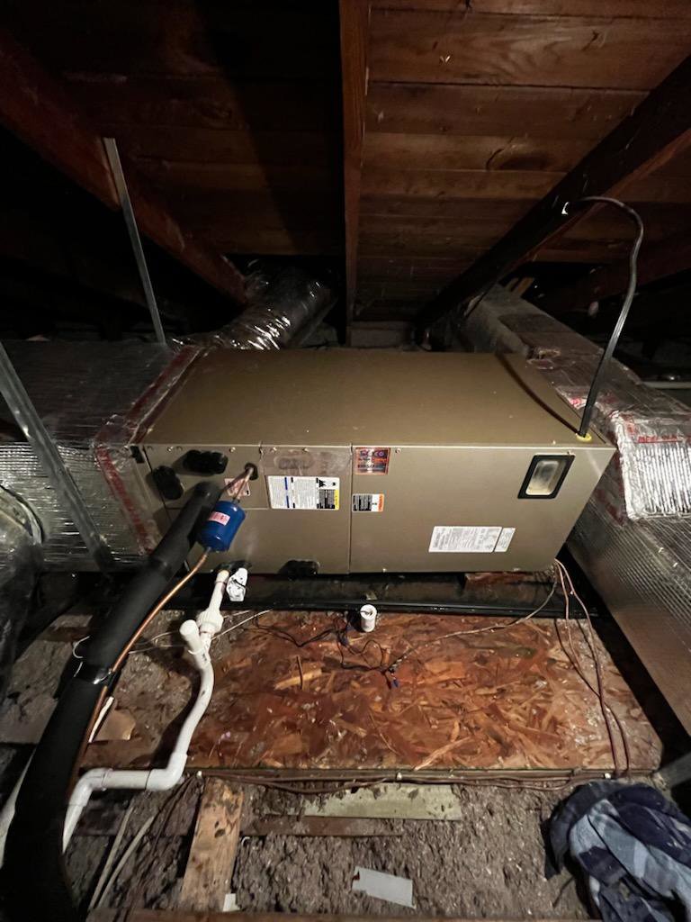 An HVAC unit and ductwork installed in an attic by Southern Comfort Heating & Cooling in Lexington, KY