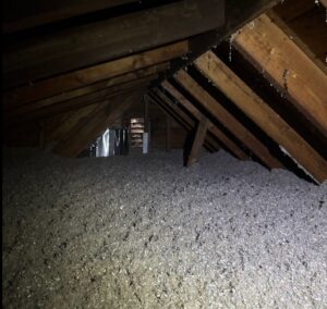 Attic space with new blown-in insulation installed by Assured Energy Solutions in Frankfort, IL.