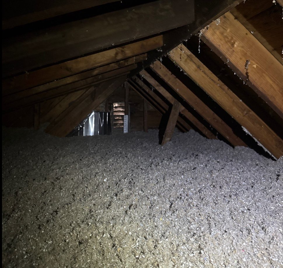 Attic space with new blown-in insulation installed by Assured Energy Solutions in Frankfort, IL.