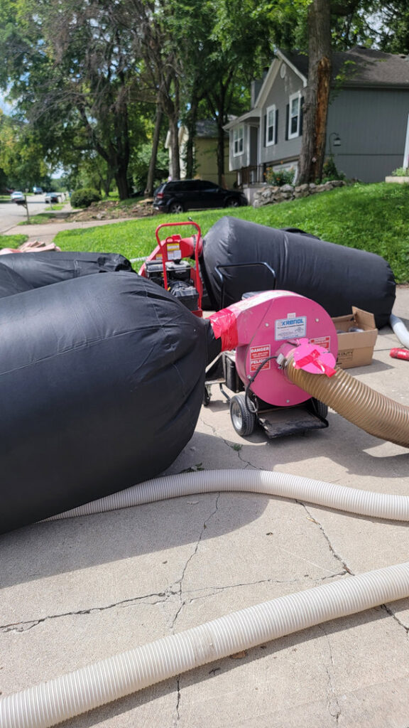 Equipment for attic insulation removal or treatment, used by KC Pest Experts for pest and wildlife control in Olathe, KS.