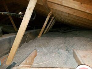 An attic space showing HVAC ductwork and insulation, maintained by Anderson Refrigeration, Inc. in Poplar Grove, IL.