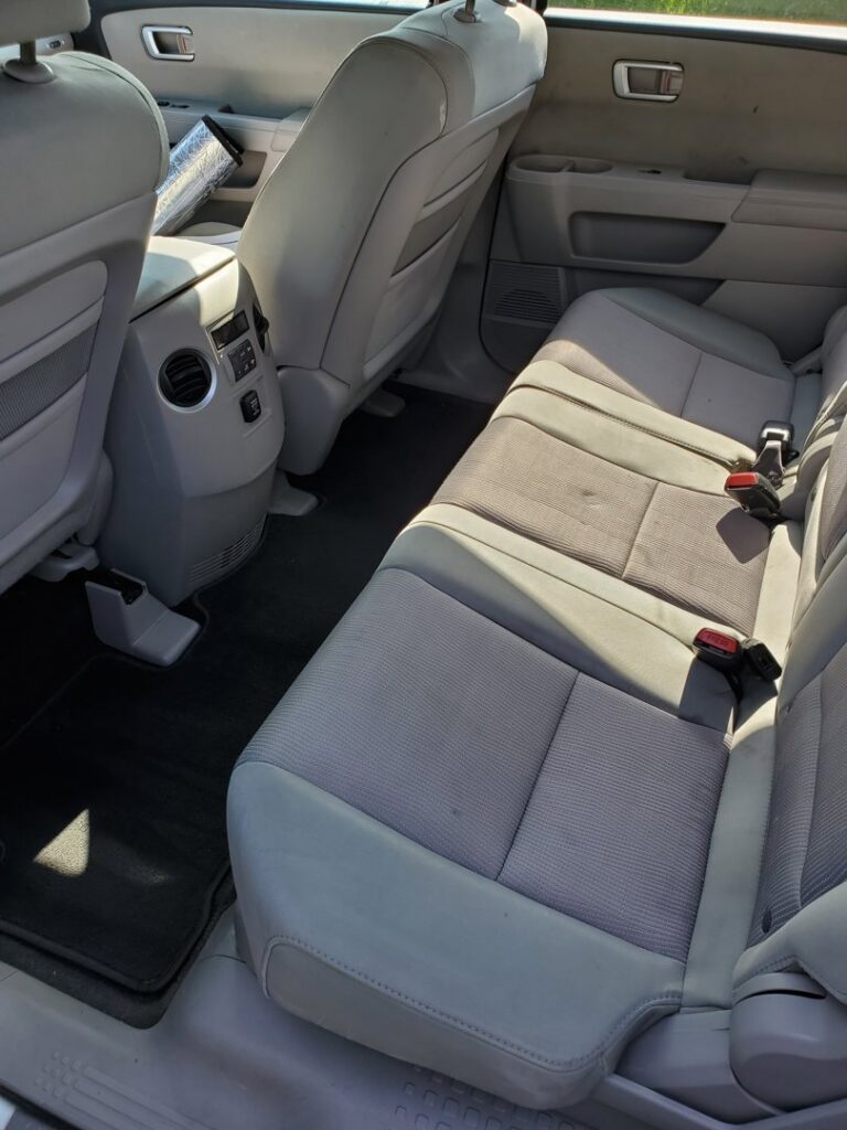 The interior of a vehicle with freshly cleaned carpet and upholstery by A Plus Carpet Cleaning in Lawton, OK.