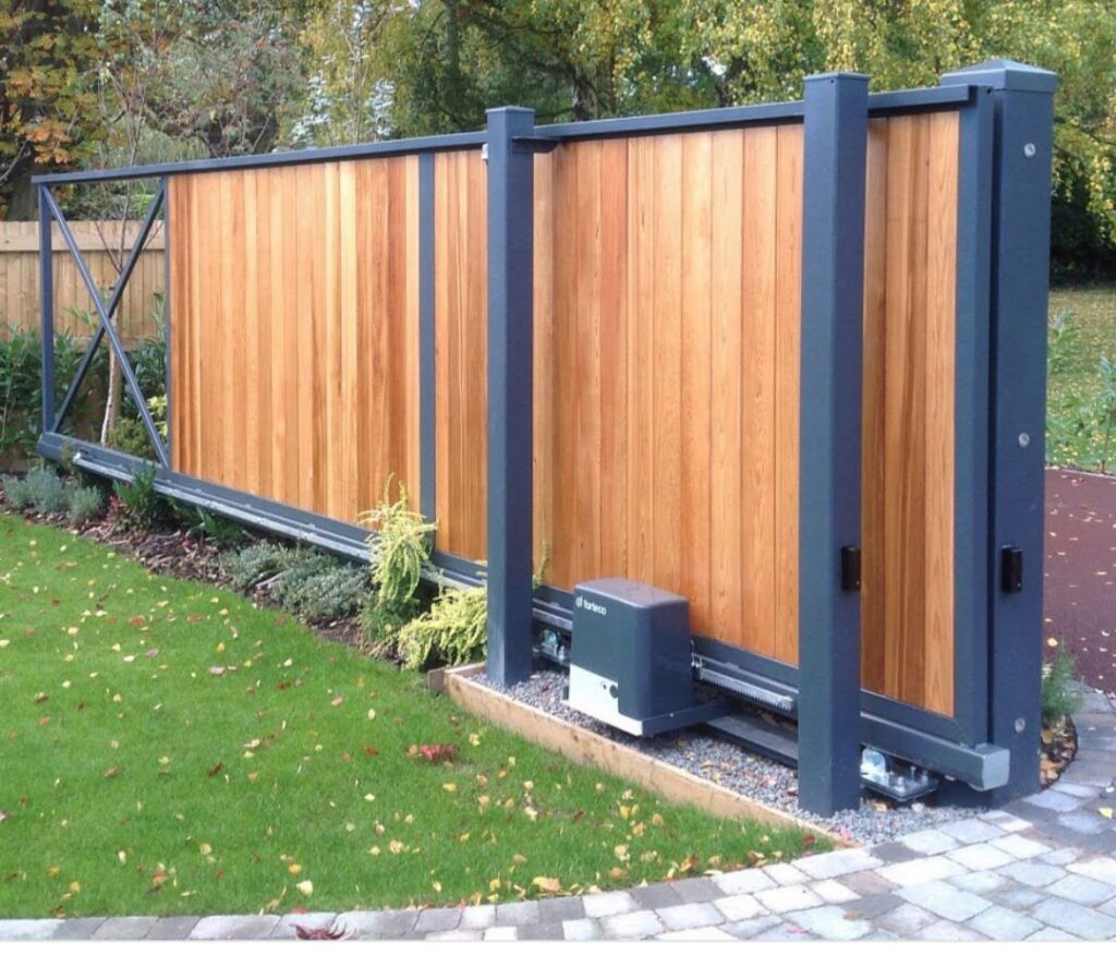 An automatic sliding gate with its electrical motor mechanism, installed by Square Electrical LLC in Alexandria, VA, for enhanced security.