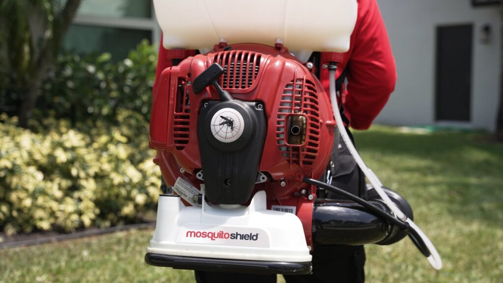 A close-up of a Mosquito Shield branded backpack sprayer, essential equipment for pest control in Downtown Atlanta, GA.