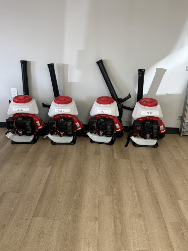 Four backpack sprayers, essential equipment for pest control services by The Pest Detective in Cleveland, OH.