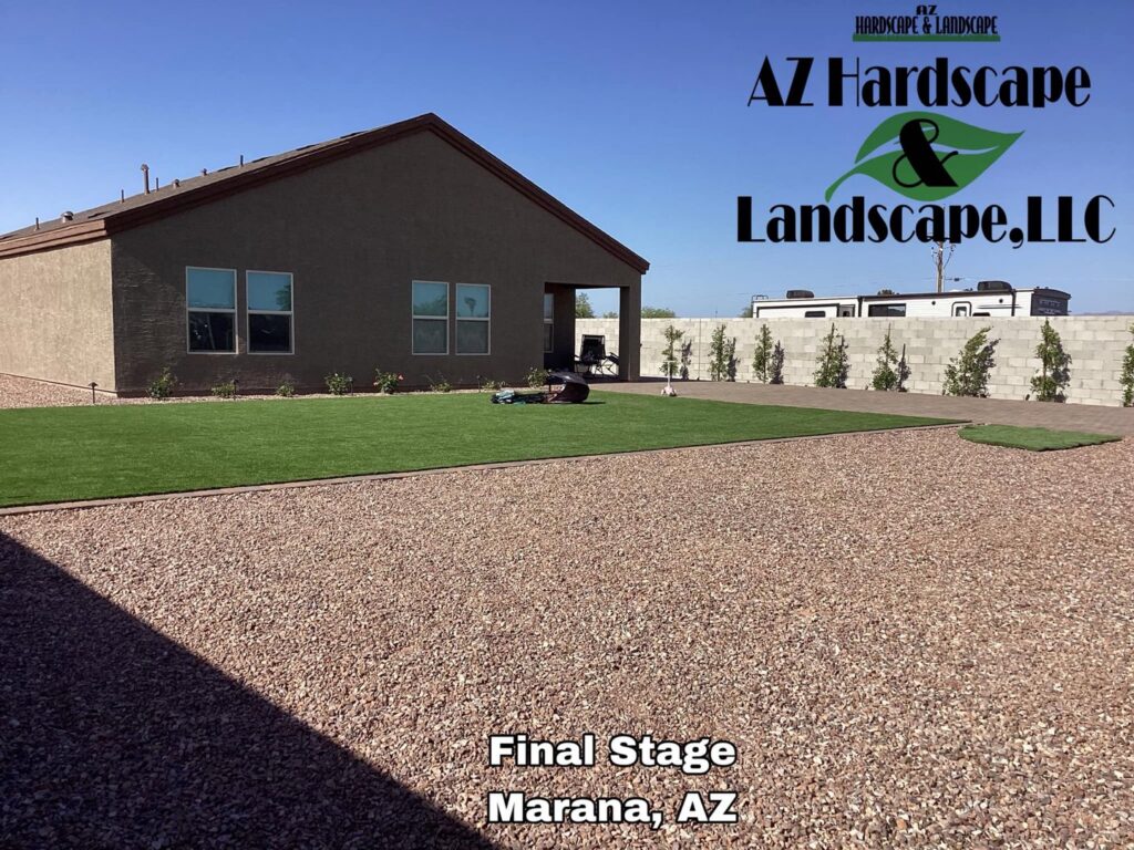 Completed backyard landscape with artificial turf and gravel, a service by AZ Hardscape & Landscape LLC in Phoenix, AZ.
