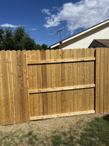 Backyard wood privacy fence panel by Builders choice Fence, Deck & Patio Covers in Nampa, ID