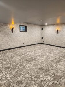 A finished basement room with new wall-to-wall carpet installed by Carpet One Floor & Home Denver in Denver, CO.