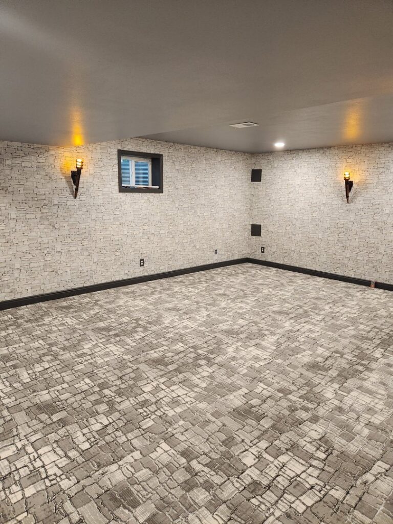 A finished basement room with new wall-to-wall carpet installed by Carpet One Floor & Home Denver in Denver, CO.