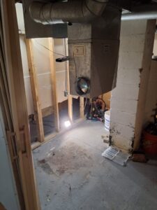New ductwork being installed in a basement by Nimmer Heating & Air Conditioning in Milwaukee, WI