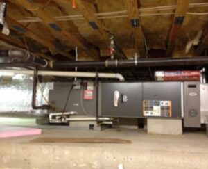 A furnace and ductwork system installed in a basement by Dodrill Comfort & Energy Solutions in Cross Lanes, WV