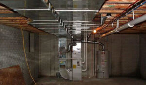 A basement furnace and extensive ductwork installation by Pugh Heating & Air Conditioning in Holland, OH.