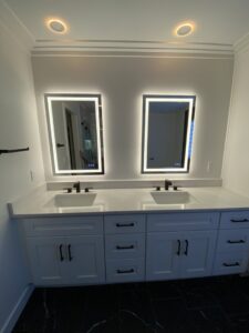 Bathroom lighting and illuminated mirror installation by CLB Electrical LLC in Townsend, DE.