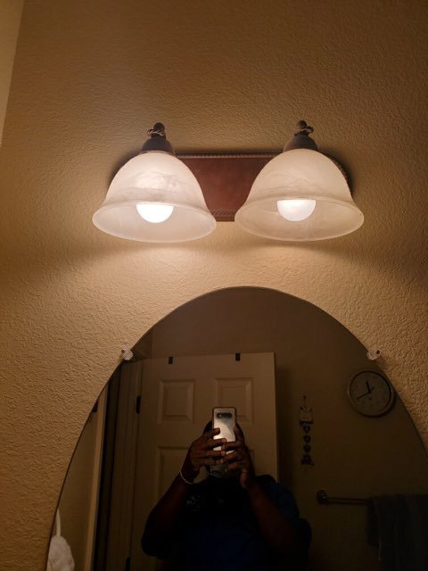 A newly installed bathroom vanity light fixture by Canyon Electric Company, Inc. in North Las Vegas, NV
