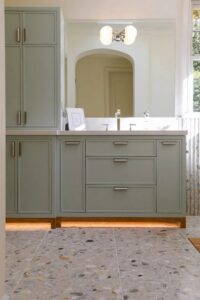 Bathroom vanity with a modern light fixture and under-cabinet lighting installed by R.C Electric, Inc. in San Francisco, CA