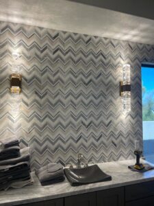 Modern wall sconces installed in a bathroom by Pro Solutions Electric in Glendale, AZ.