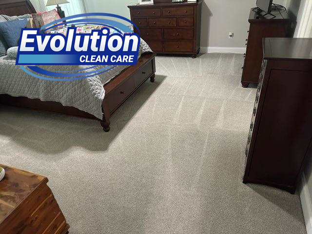 A bedroom carpet looking fresh and clean after professional service by Evolution Clean Care in Knoxville, TN