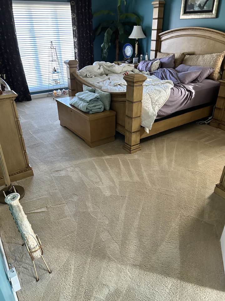 Bedroom carpet showing distinct cleaning lines after professional service by Louisville's Finest Carpet & Upholstery Care LLC in Louisville, KY