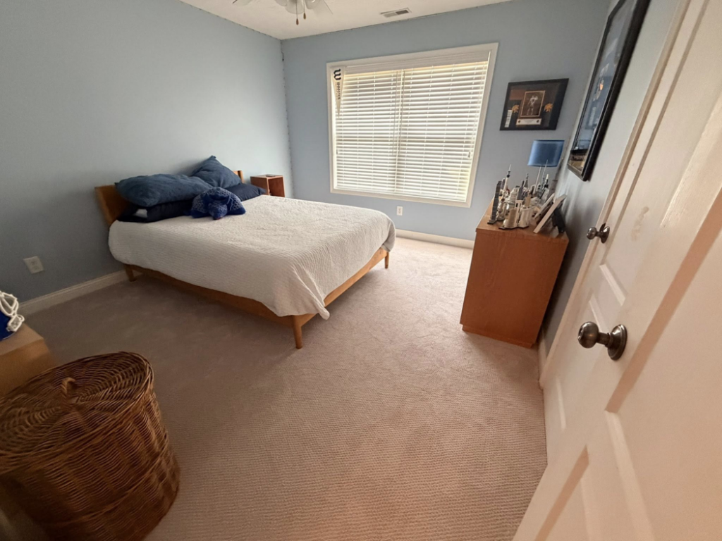 Professional carpet installation in a bedroom completed by A Step Above Flooring in Lexington, KY