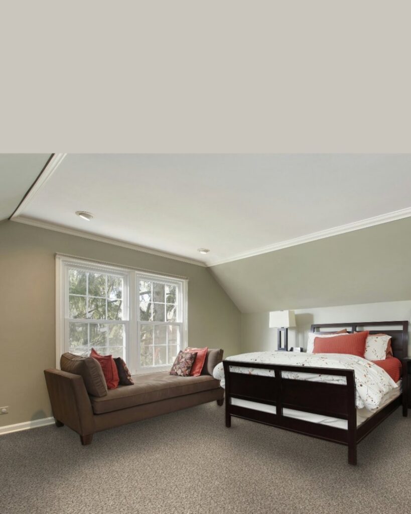 A cozy bedroom featuring newly installed light brown carpet, a service provided by ALL Floorz in Toledo, OH.