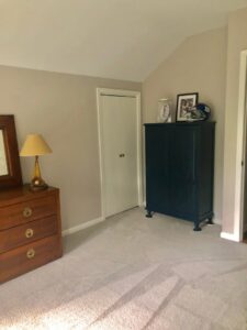 A bedroom with light gray carpet recently installed by Carpet King and Flooring in Myrtle Beach, SC.