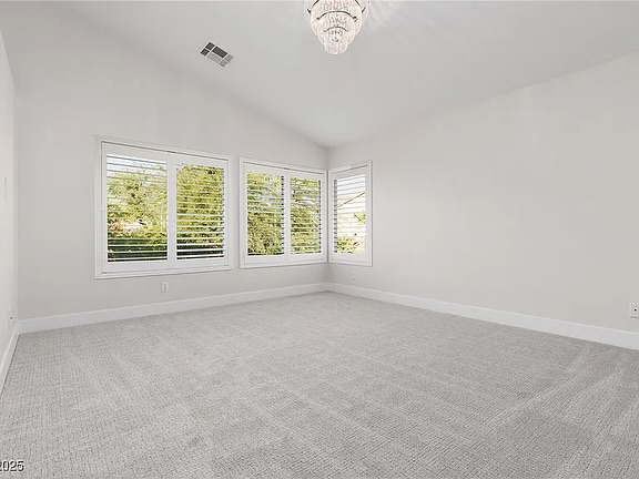 Clean, new light gray carpet installed in a bedroom, a service by Floors by Aldaba LLC in North Las Vegas, NV.