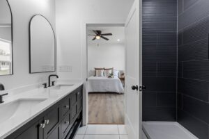 A newly installed ceiling fan in a modern bedroom, showcasing electrician services by Braden the handyman in Knoxville, TN