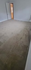 A bedroom featuring newly installed light brown carpet by Stellar Remodeling in Maggie Valley, NC