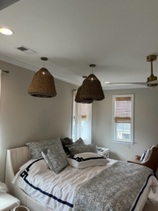 New light fixtures and a ceiling fan installed in a bedroom by Strother & Son Electric in Mount Pleasant, SC.