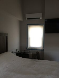 An indoor mini-split air conditioning unit installed in a bedroom by Green Air Heating&Cooling in Philadelphia, PA.