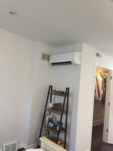 An indoor mini-split unit installed on a bedroom wall by Green Air Heating&Cooling in Philadelphia, PA.