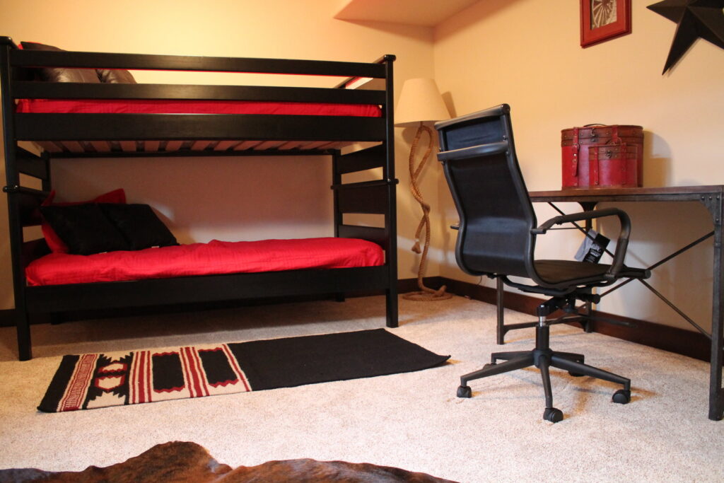 A modern bedroom featuring comfortable wall-to-wall carpet installed by Rich's Modern Flooring in Billings, MT.
