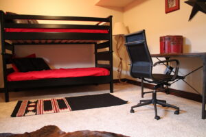 A modern bedroom featuring comfortable wall-to-wall carpet installed by Rich's Modern Flooring in Billings, MT.