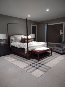 A modern bedroom with clean, wall-to-wall carpet, showcasing the quality work of Clean Freaks in Ogden, UT.