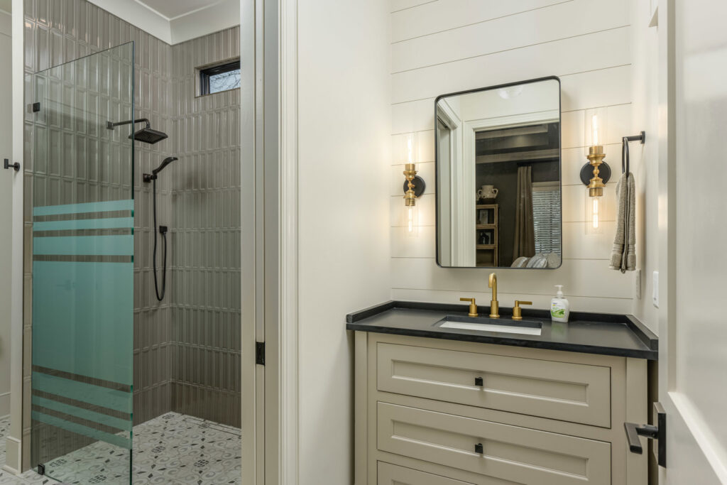 A clean bedroom featuring freshly installed grey carpet by Dalton Wholesale in Adairsville, GA.