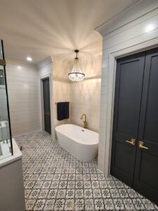 A cozy bedroom featuring a new light-colored carpet installation by Dalton Wholesale in Adairsville, GA.