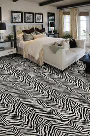 A stylish bedroom featuring a bold zebra print carpet installed by My Affordable Floors Inc. in Kenosha, WI.