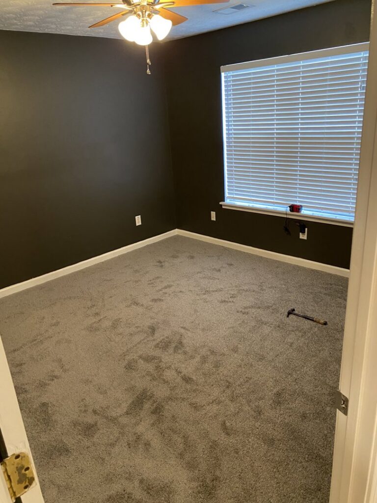 Before and after comparison of a dirty carpet being professionally cleaned by Lestage Construction Carpet & Flooring in Atlanta, GA.