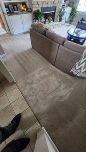Before and after comparison of carpet cleaning in a living room by Hartford's Carpet Cleaning in Toledo, OH