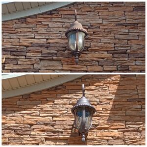 Before and after of an exterior wall sconce replacement on a stone wall by Elite Electrical TN in Jackson, TN.